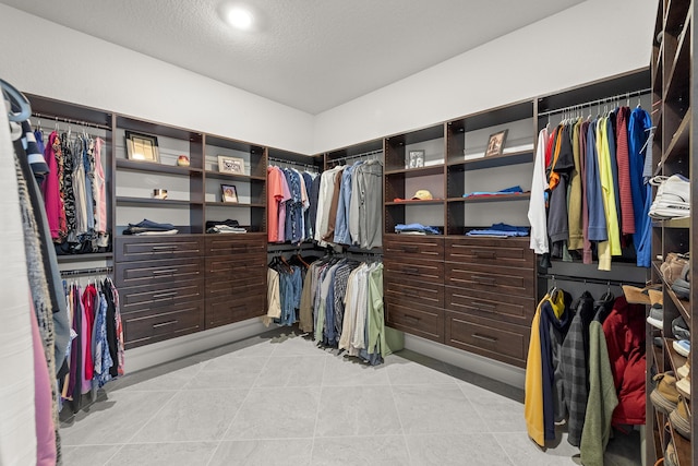 10339 SW Tetian Dr, Port Saint Lucie, FL 34987 - spacious closet featuring light tile patterned floors