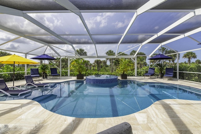 10339 SW Tetian Dr, Port Saint Lucie, FL 34987 - view of swimming pool with a patio area, a lanai, and a pool with connected hot tub