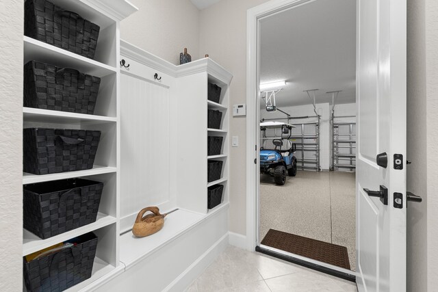 10339 SW Tetian Dr, Port Saint Lucie, FL 34987 - mudroom with tile patterned flooring