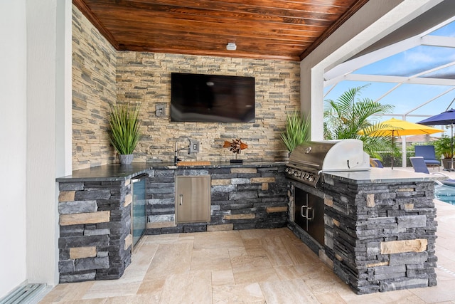 10339 SW Tetian Dr, Port Saint Lucie, FL 34987 - view of patio / terrace featuring a lanai and a sink