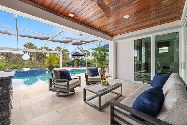 10339 SW Tetian Dr, Port Saint Lucie, FL 34987 - view of patio featuring an outdoor hangout area, glass enclosure, and a pool with connected hot tub