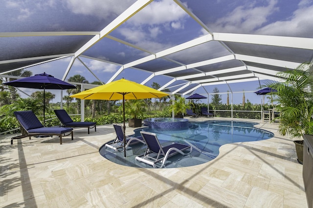 10339 SW Tetian Dr, Port Saint Lucie, FL 34987 - view of swimming pool with a patio area, a pool with connected hot tub, and glass enclosure