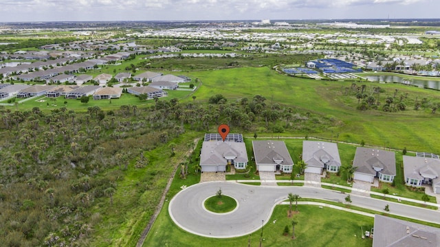 10339 SW Tetian Dr, Port Saint Lucie, FL 34987 - aerial overview of property's location featuring nearby suburban area and a nearby body of water