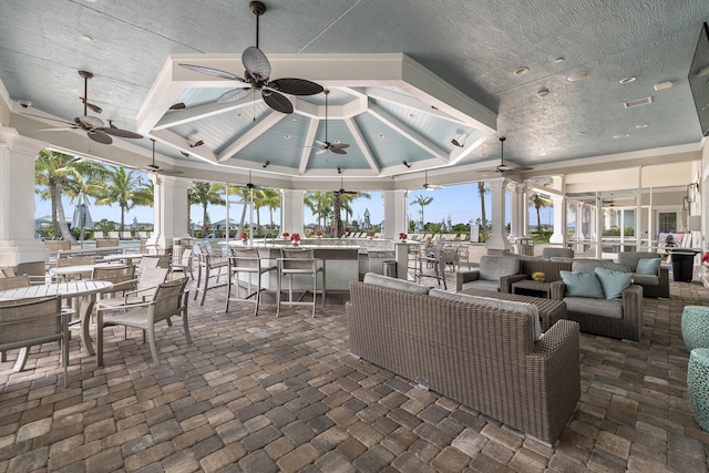 10339 SW Tetian Dr, Port Saint Lucie, FL 34987 - view of patio featuring an outdoor hangout area, ceiling fan, and an outdoor bar