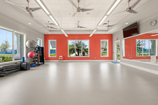 10339 SW Tetian Dr, Port Saint Lucie, FL 34987 - garage featuring baseboards and ceiling fan