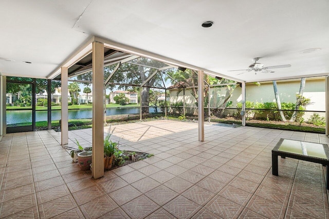 16703 Hidden Cove Dr, Jupiter, FL 33477 - view of patio featuring a water view, a ceiling fan, and a lanai