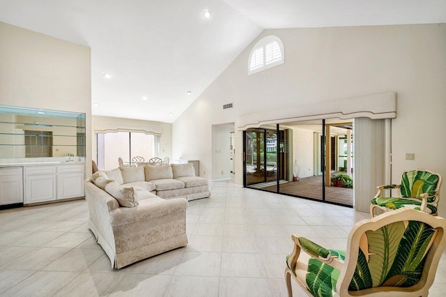 16703 Hidden Cove Dr, Jupiter, FL 33477 - living area featuring high vaulted ceiling and light tile patterned floors