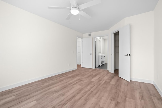 1825 Palm Cove Blvd Unit 7-307, Delray Beach, FL 33445 - unfurnished bedroom with light wood finished floors, baseboards, and a ceiling fan