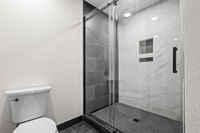1825 Palm Cove Blvd Unit 7-307, Delray Beach, FL 33445 - full bath featuring toilet, tile patterned floors, and a shower stall