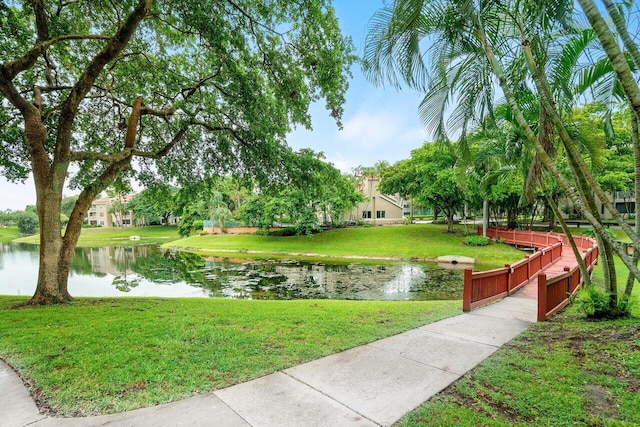 1825 Palm Cove Blvd Unit 7-307, Delray Beach, FL 33445 - surrounding community featuring a yard and a water view