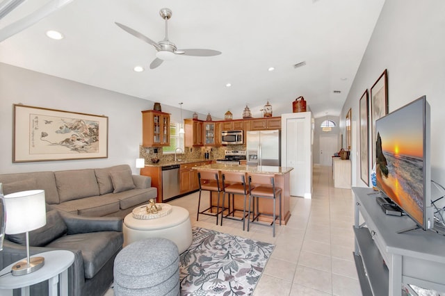 5630 Eagle Trace Ct, Lake Worth, FL 33463 - living room with a ceiling fan, light tile patterned floors, and recessed lighting