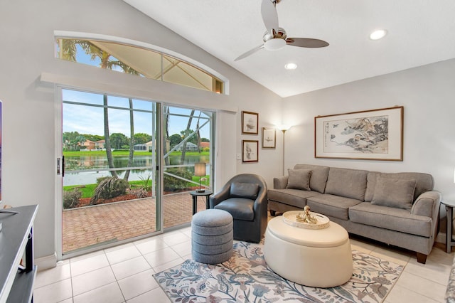 5630 Eagle Trace Ct, Lake Worth, FL 33463 - living area featuring lofted ceiling, light tile patterned floors, ceiling fan, a water view, and recessed lighting