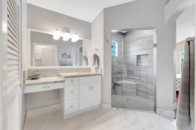5630 Eagle Trace Ct, Lake Worth, FL 33463 - bathroom featuring vanity, a shower stall, marble finish floors, and baseboards