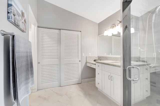 5630 Eagle Trace Ct, Lake Worth, FL 33463 - bathroom featuring a shower stall, marble look tile flooring, vanity, a closet, and lofted ceiling