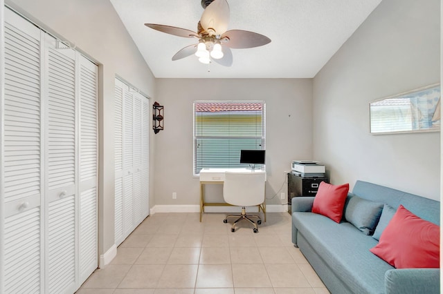 5630 Eagle Trace Ct, Lake Worth, FL 33463 - home office with ceiling fan, baseboards, light tile patterned flooring, and lofted ceiling
