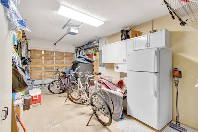 5630 Eagle Trace Ct, Lake Worth, FL 33463 - garage featuring freestanding refrigerator and a garage door opener