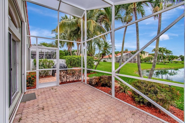 5630 Eagle Trace Ct, Lake Worth, FL 33463 - unfurnished sunroom with a water view