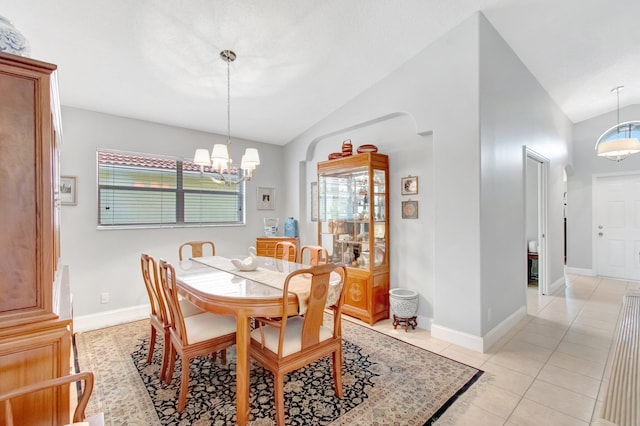 5630 Eagle Trace Ct, Lake Worth, FL 33463 - dining room featuring lofted ceiling, plenty of natural light, a chandelier, and baseboards