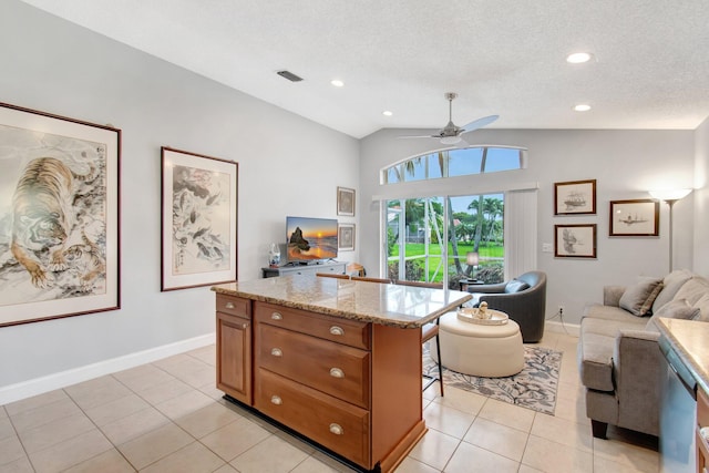 5630 Eagle Trace Ct, Lake Worth, FL 33463 - office area featuring ceiling fan, vaulted ceiling, light tile patterned flooring, baseboards, and a textured ceiling