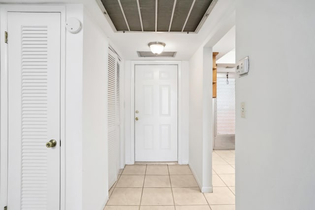 4500 N Federal Hwy Unit 367H, Lighthouse Point, FL 33064 - hall with light tile patterned floors and baseboards