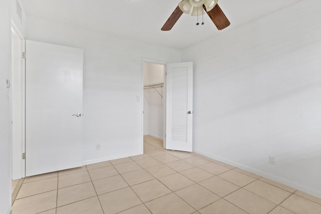 4500 N Federal Hwy Unit 367H, Lighthouse Point, FL 33064 - unfurnished bedroom featuring light tile patterned flooring, a closet, and ceiling fan