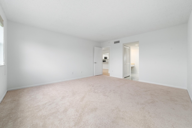 16091 Blatt Blvd Unit 302, Weston, FL 33326 - unfurnished bedroom featuring carpet, baseboards, and ensuite bath