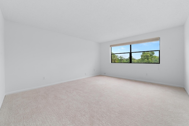 16091 Blatt Blvd Unit 302, Weston, FL 33326 - unfurnished room featuring baseboards and light colored carpet