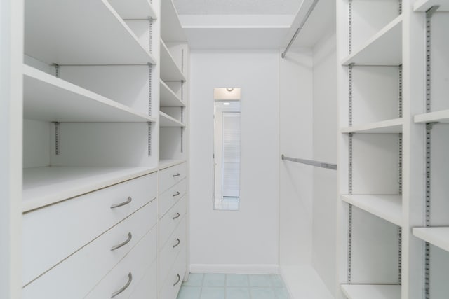 16091 Blatt Blvd Unit 302, Weston, FL 33326 - walk in closet with light tile patterned floors