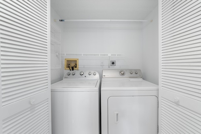 16091 Blatt Blvd Unit 302, Weston, FL 33326 - washroom featuring washing machine and clothes dryer