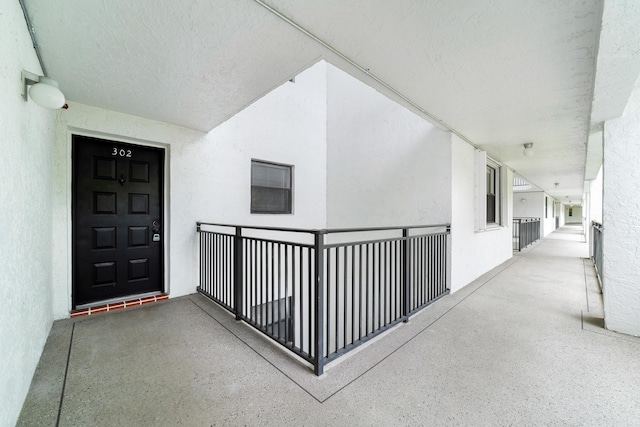 16091 Blatt Blvd Unit 302, Weston, FL 33326 - entrance to property with a balcony and stucco siding