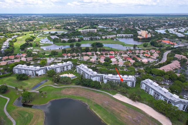 16091 Blatt Blvd Unit 302, Weston, FL 33326 - drone / aerial view of apartment complex, a nearby body of water, and a golf club