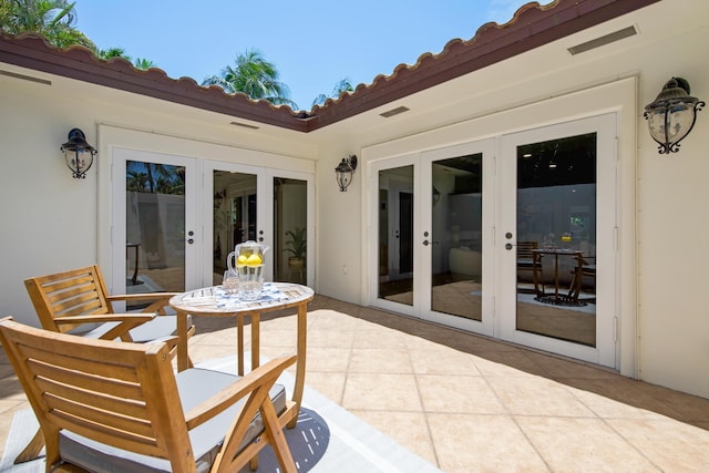 330 SE 7th Ave, Delray Beach, FL 33483 - view of patio / terrace featuring french doors