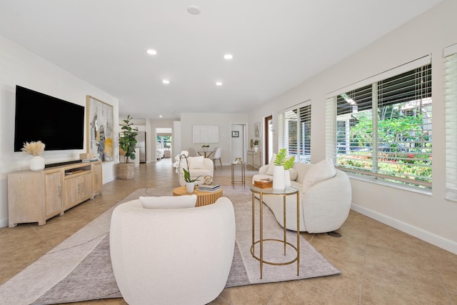 330 SE 7th Ave, Delray Beach, FL 33483 - living area featuring recessed lighting, baseboards, and light tile patterned flooring
