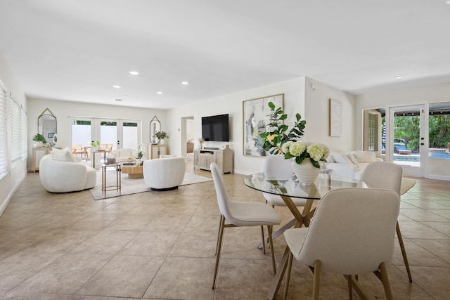 330 SE 7th Ave, Delray Beach, FL 33483 - dining room with light tile patterned flooring, french doors, recessed lighting, and baseboards