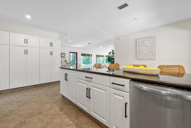 330 SE 7th Ave, Delray Beach, FL 33483 - kitchen featuring dishwasher, dark countertops, white cabinetry, recessed lighting, and light tile patterned floors