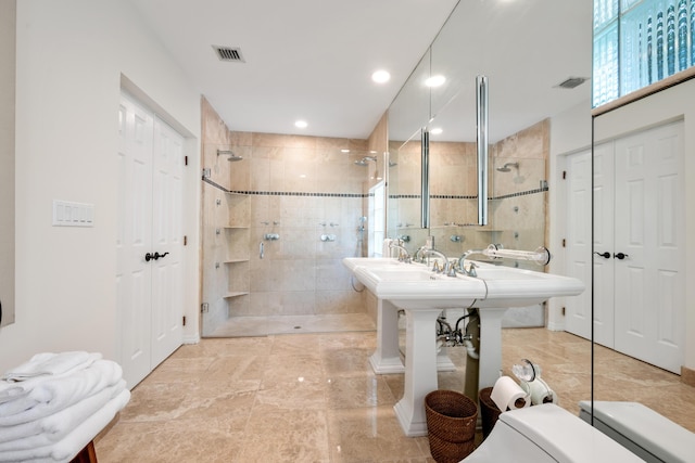 330 SE 7th Ave, Delray Beach, FL 33483 - bathroom featuring a tile shower, a closet, recessed lighting, and toilet