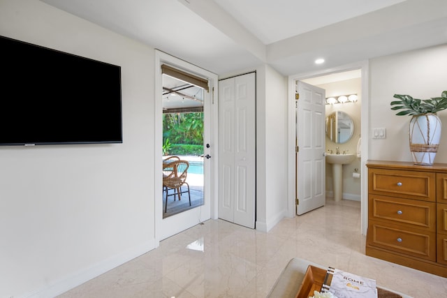 330 SE 7th Ave, Delray Beach, FL 33483 - foyer entrance with light marble finish flooring, baseboards, and recessed lighting