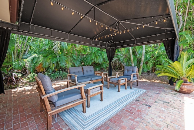 330 SE 7th Ave, Delray Beach, FL 33483 - view of patio with a gazebo and an outdoor living space