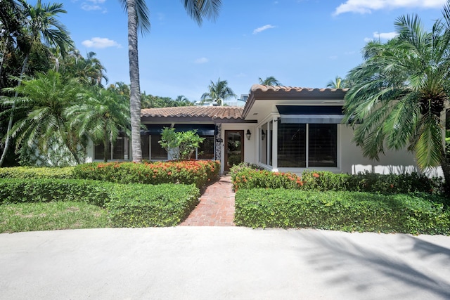 330 SE 7th Ave, Delray Beach, FL 33483 - view of front of property featuring stucco siding and a tiled roof