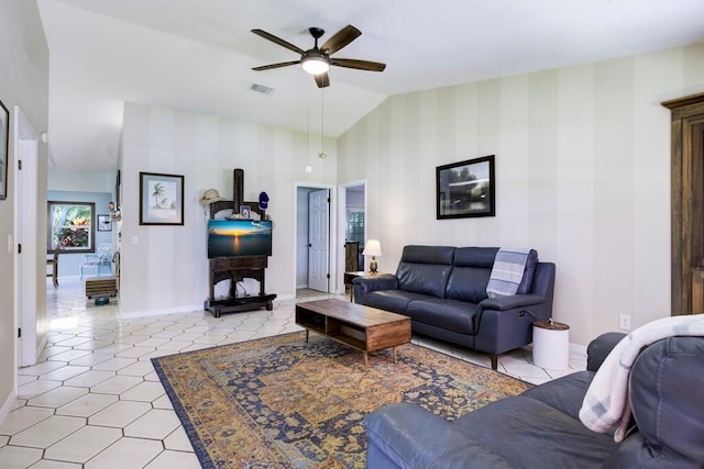 3725 SE Middle St, Stuart, FL 34997 - living area with a ceiling fan, lofted ceiling, baseboards, and wallpapered walls