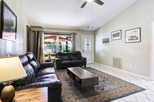 3725 SE Middle St, Stuart, FL 34997 - tiled living room featuring lofted ceiling, ceiling fan, and baseboards
