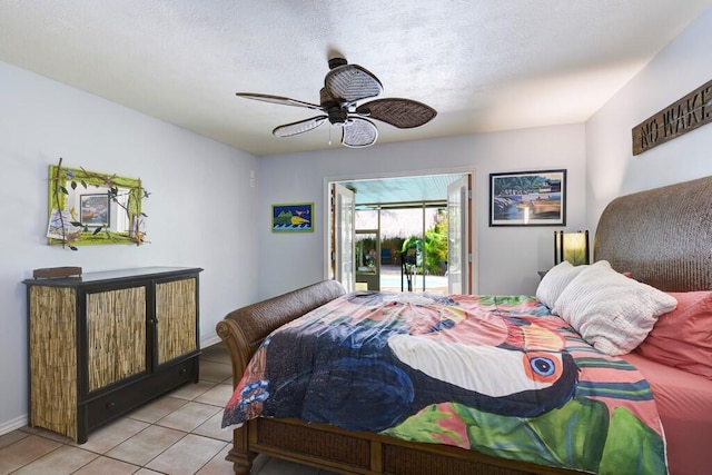 3725 SE Middle St, Stuart, FL 34997 - bedroom with access to exterior, light tile patterned floors, and ceiling fan