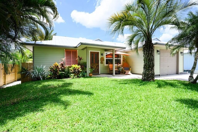 3725 SE Middle St, Stuart, FL 34997 - ranch-style home featuring a garage