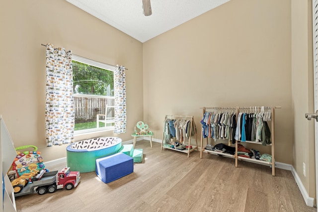 6815 NW 28th St, Margate, FL 33063 - playroom with wood finished floors, baseboards, and ceiling fan