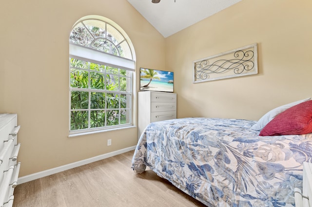6815 NW 28th St, Margate, FL 33063 - bedroom featuring wood finished floors, lofted ceiling, and baseboards
