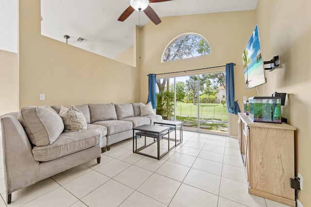 6815 NW 28th St, Margate, FL 33063 - living area with ceiling fan, light tile patterned floors, and high vaulted ceiling