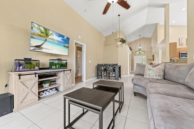 6815 NW 28th St, Margate, FL 33063 - living room featuring ceiling fan, high vaulted ceiling, light tile patterned flooring, and baseboards