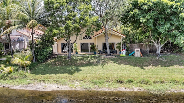 6815 NW 28th St, Margate, FL 33063 - rear view of property with stucco siding