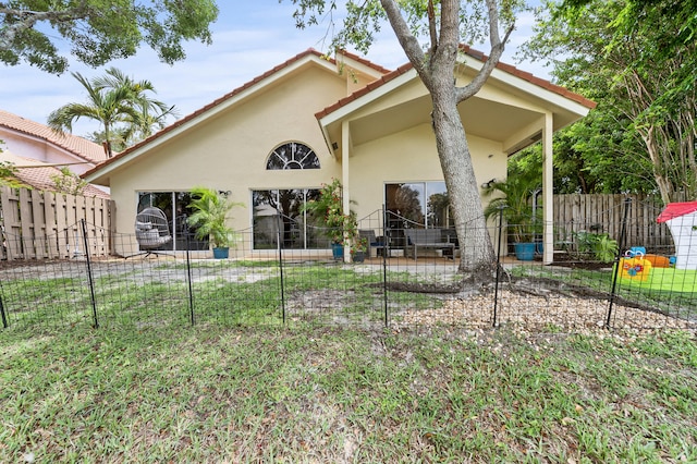 6815 NW 28th St, Margate, FL 33063 - rear view of property with stucco siding