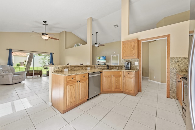 6815 NW 28th St, Margate, FL 33063 - kitchen featuring dishwasher, a ceiling fan, open floor plan, high vaulted ceiling, and light tile patterned floors